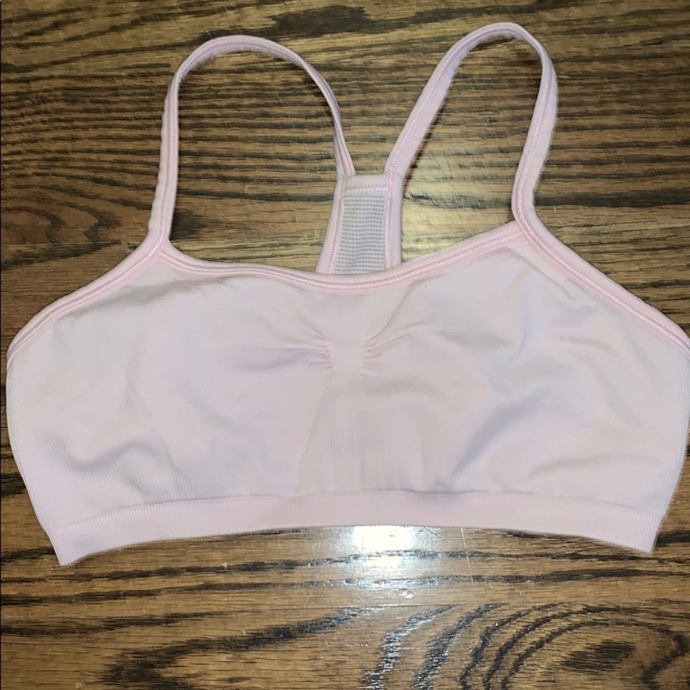 Like new ivivva pastel/ light pink sports bra.